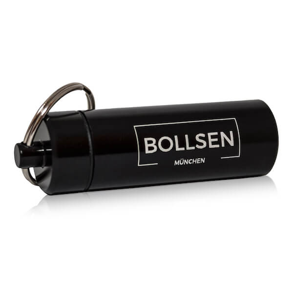 Black cylindrical case with keyring, labelled BOLLSEN Earplugs Hearing Protection in white.
