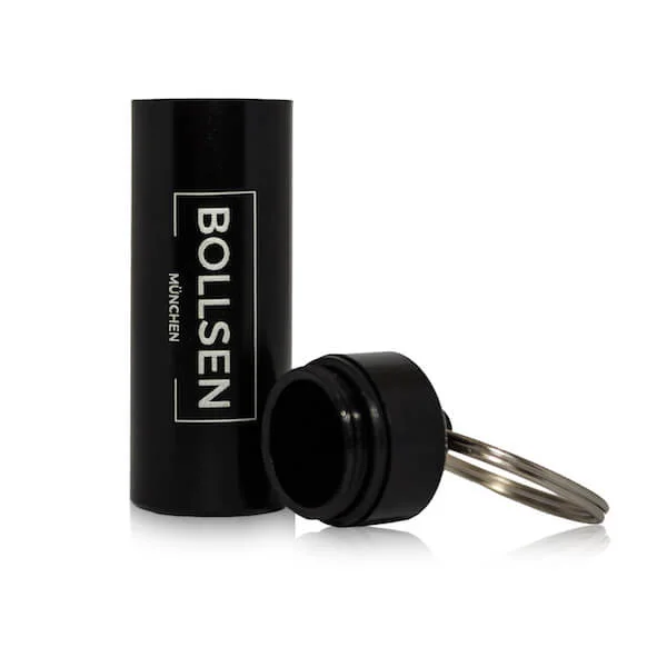 Black cylindrical case with BOLLSEN Earplugs Hearing Protection and silver keyring.