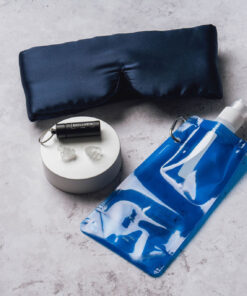 Mask, earplugs on a stand and bottle bundle